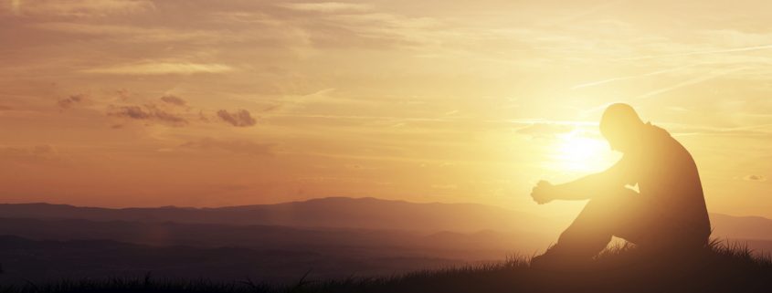 Man Praying Sunset